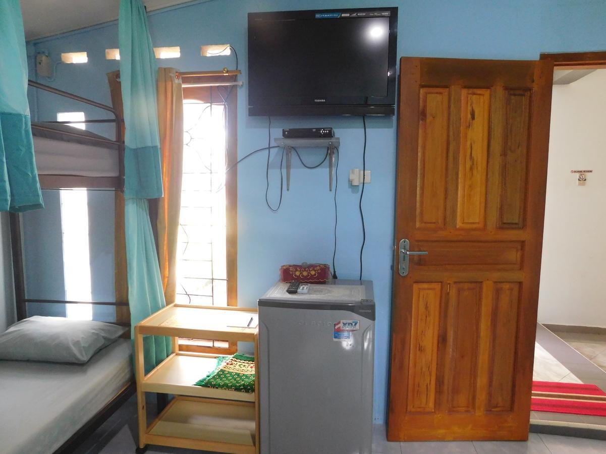 Апартаменты Belitung Backpacker Танджунгпандан Экстерьер фото
